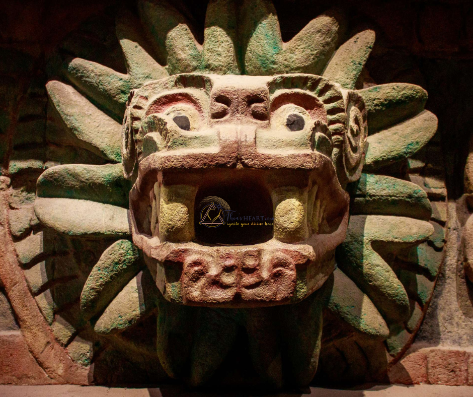 Althea Provost Starseed Mexico Adventure 2023 viewing the Feathered Serpent carving at Teotihuacan, reflecting the artistry and symbolism of Mexico’s ancient past.