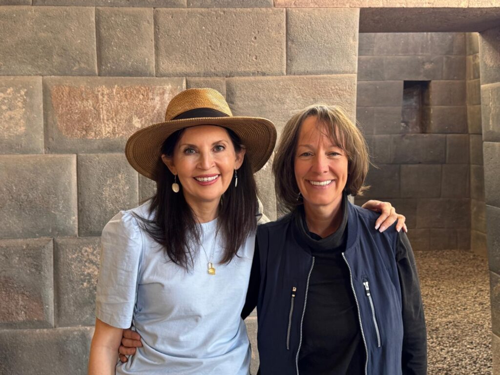 Althea Provost at the Temple of Lightning Starseed Peru Adventure 2025 - Thea's Heart Where Living Architecture and expanded awareness took root: Althea Provost standing with a fellow starseed in front of the Temple of Lightning at Coricancha during the Starseed Peru Adventure 2025.