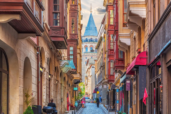 Street view of Galata Tower explored during the Starseed Türkiye Adventure with Althea Provost, showcasing Istanbul’s vibrant architecture and culture.