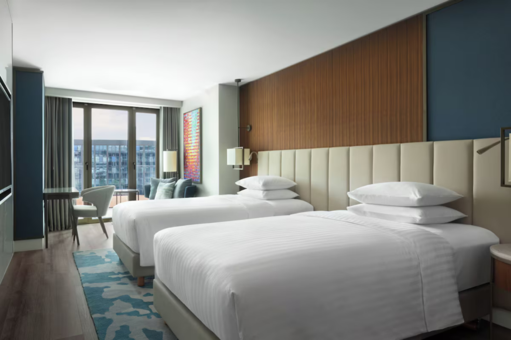 Marriott double‑bed room on the Starseed Türkiye Adventure with Althea Provost, featuring modern décor and city views.