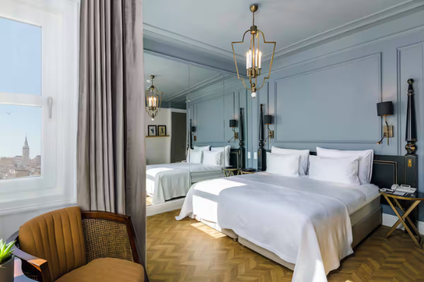 Single room at The Soul Hotel during the Starseed Türkiye Adventure with Althea Provost, featuring refined décor and a cityscape view.