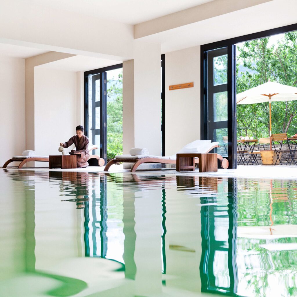 Starseed Bhutan Adventure with Althea Provost swimming pool area at COMO Uma Paro.