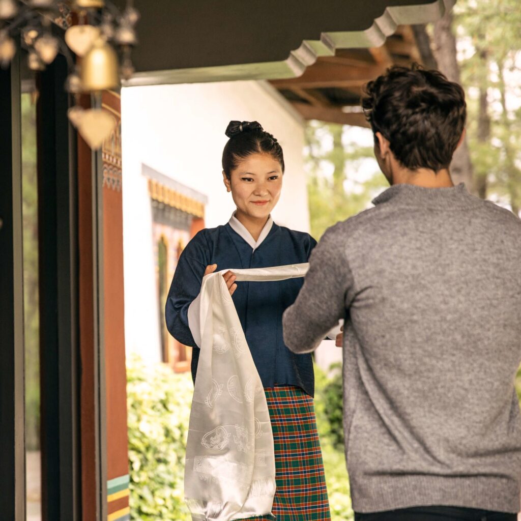 Starseed Bhutan Adventure with Althea Provost Bhutanese welcome with white scarf exchange.