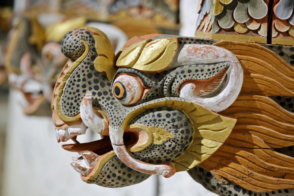 Starseed Bhutan Adventure with Althea Provost dragon head on a monastery facade in Bhutan
