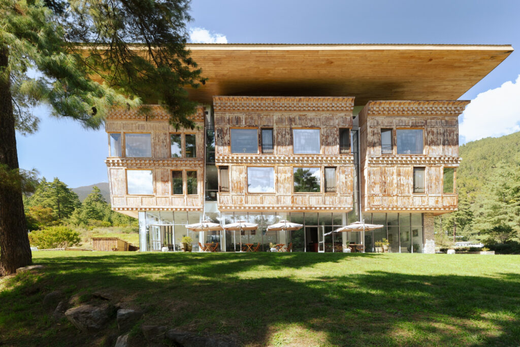 Starseed Bhutan Adventure with Althea Provost — exterior of Zhiwaling Ascent, a Michelin‑recommended Bhutanese property with mountain views.