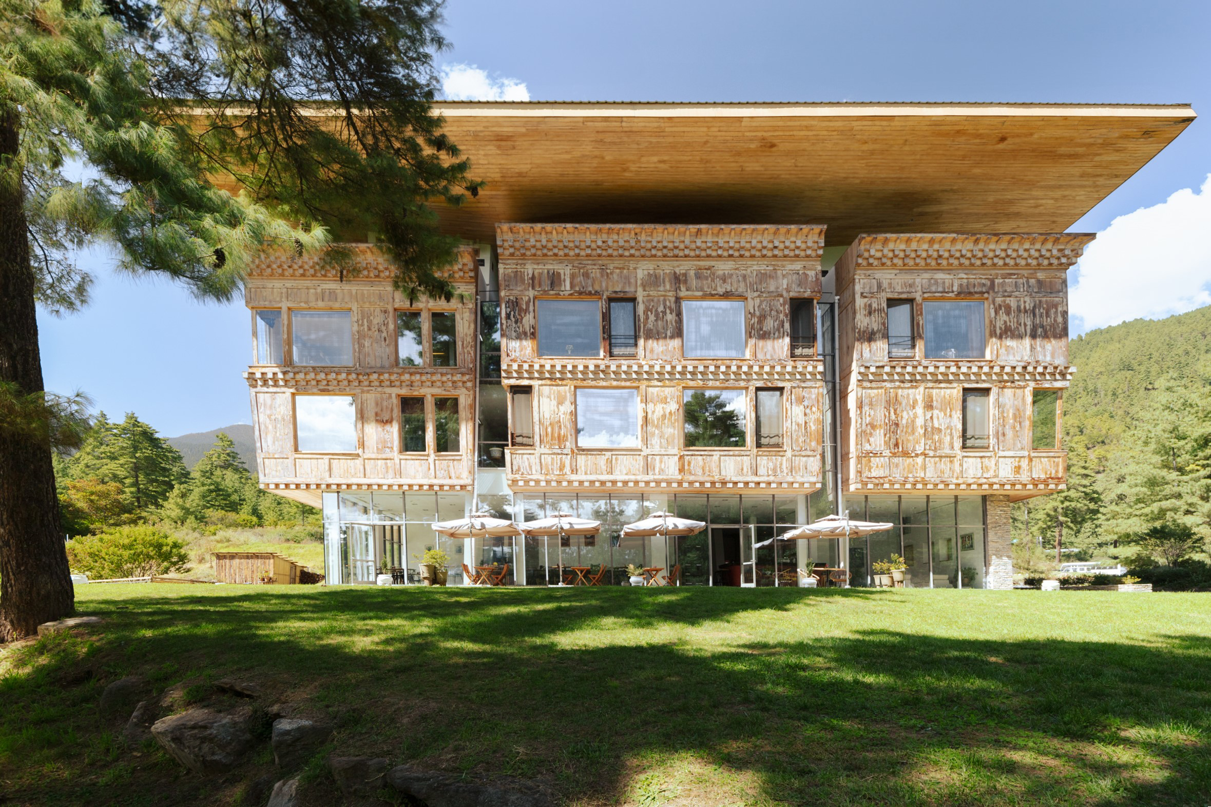 Starseed Bhutan Adventure with Althea Provost — exterior of Zhiwaling Ascent, a Michelin‑recommended Bhutanese property with mountain views.